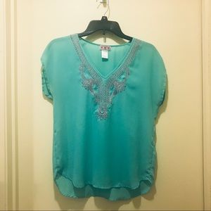 2 tops - one blue and one salmon